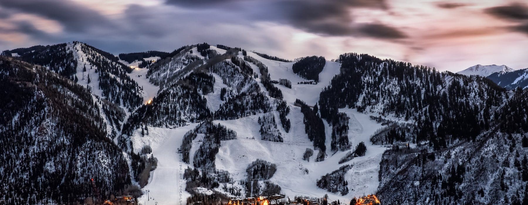 Snowy ski resort at dusk